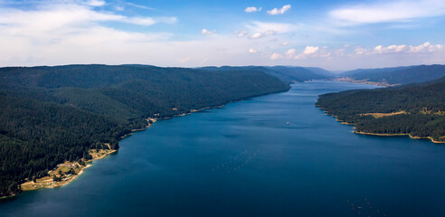 Fototapeta na wymiar Stunning aerial panorama view of the lake coastline, Dospat, Bulgaria