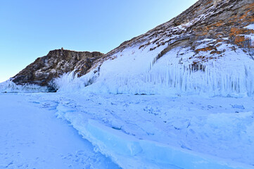 Beautiful Snow Covered Cliff on Frozen Lake Baikal in Russia