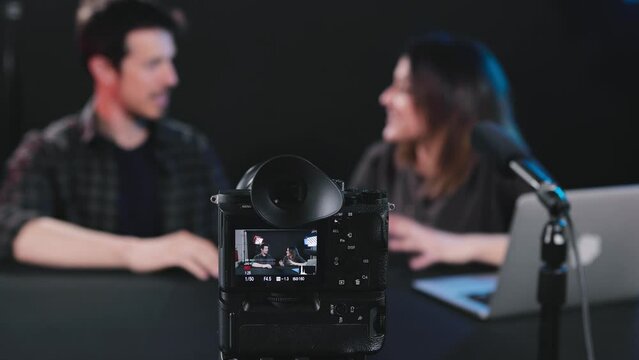 Man and woman Content creators broadcasting live interview for social media