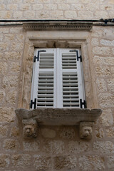 Fototapeta na wymiar Old window in medieval town
