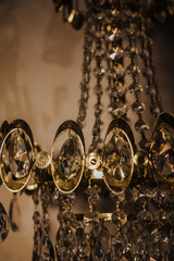 vintage golden chandelier on a dark background