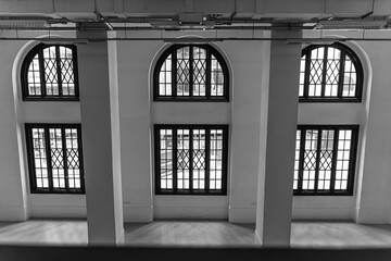 building with large windows, black and white