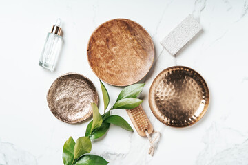 Flat lay of mockup plates for body care essentials.