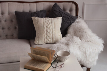 Soft comfortable stylish beautiful knitted pillows and book