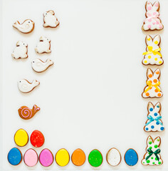 lots of Easter gingerbread on a white background. High quality photo space for text flatly