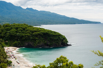 Tropical Beach Landscape with White Sand and Blue Ocean Water, View from the Mountain.
