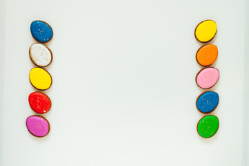 lots of Easter gingerbread on a white background. High quality photo space for text flatly