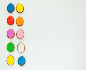 lots of Easter gingerbread on a white background. High quality photo space for text flatly