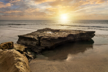 Fototapeta na wymiar Flat rock, Torrey pines beach sunset, San Diego California