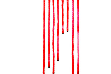 Red water color drips down on white background,Or as drop of blood,Abstract color	