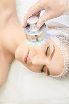 Light therapy procedure. Heal beauty treatment. Woman facial device. Anti age and wrinkle.