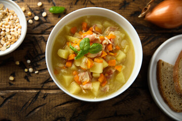 Homemade pea soup with smoked pork