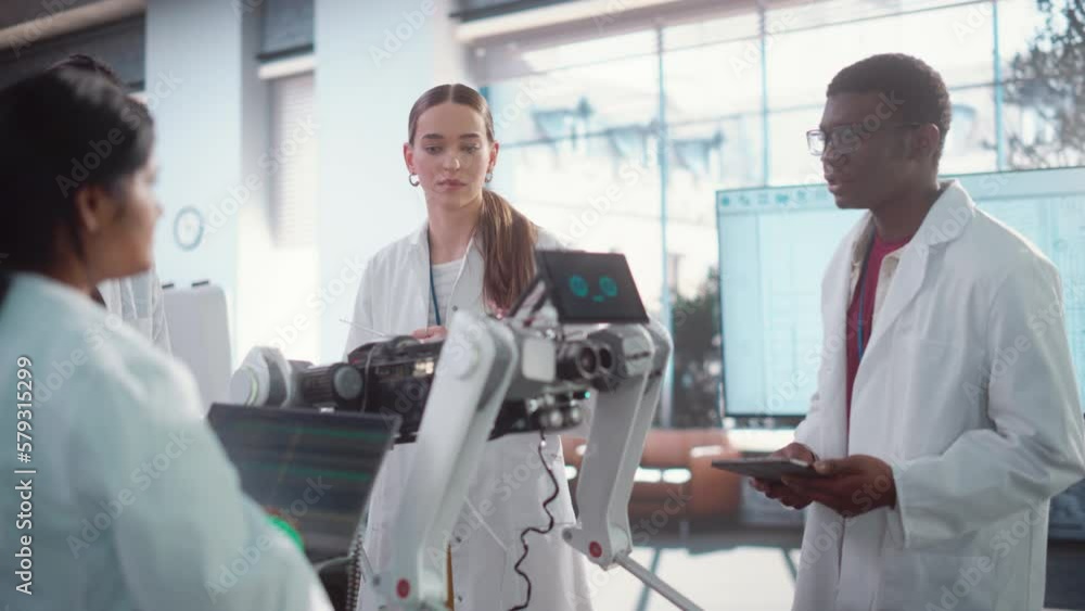 Poster Diverse Team of Industrial Robotics Specialists Gathered Around a Table With a Mobile Robot. Engineers In Lab Coats Discussing an Automated AI Robotic Dog, Using Laptop and Tablet, Brainstorming