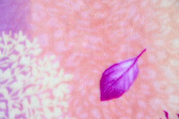 Pink leaf on the background of snowflakes. Toned.