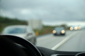 Driving a car - perspective of a driver - bokeh effect