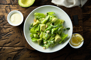 Healthy green salad with avocado