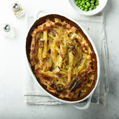 Traditional homemade potato gratin with herbs
