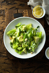 Healthy green salad with avocado