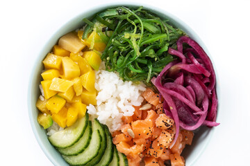 Poke bowl with rice, salmon,cucumber,mango,onion,wakame salad, poppy seeds ands sunflowers seeds isolated on white background