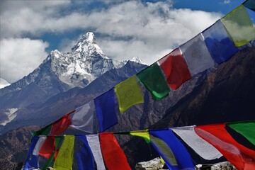 Colourful Tibetan prayer flags with Mt. Ama Dablam in the backdrop