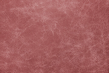 Genuine, natural, artificial red leather texture background. Luxury material for header, banner, backdrop, wallpaper, clothes, furniture and interior design. ecological friendly leatherette.