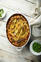Traditional homemade potato gratin with herbs