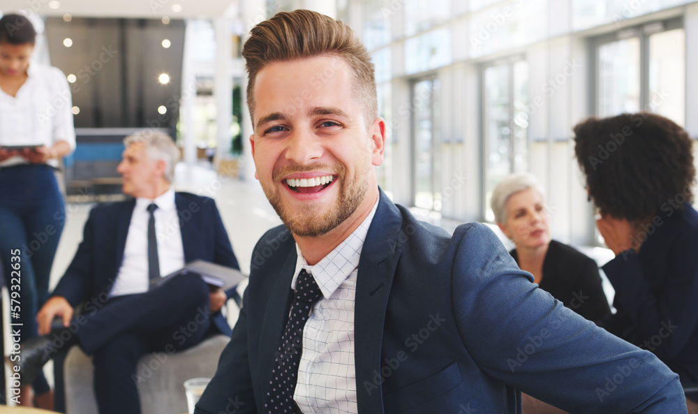 Poster i am a part of the best project. cropped portrait of a handsome young businessman sitting and smilin