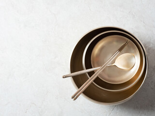 Various bowls made of brass, background