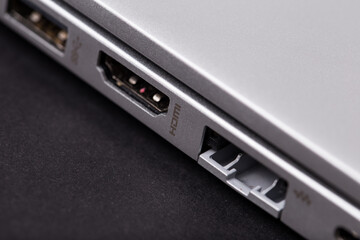 Sign ndmi on a gray laptop case close-up.