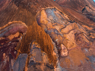 Aerial photos of Calhau, a village located near an inactive volcano in Sao Vicente Island, Cabo Verde, offer a unique perspective of the towering volcanic landscape, rugged terrain, and vibrant coasta