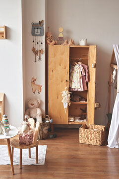 Nursery interior. Wooden toys in children's room.