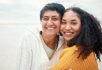 Happy, hug and portrait of a mother and daughter at the beach for travel, bonding and vacation....