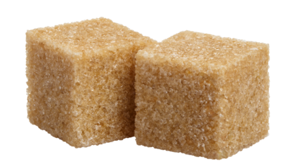 Close-up of two brown sugar cubes, cut out