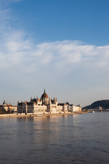 Fototapeta premium View on Budapest Parliament building across the river at daytime