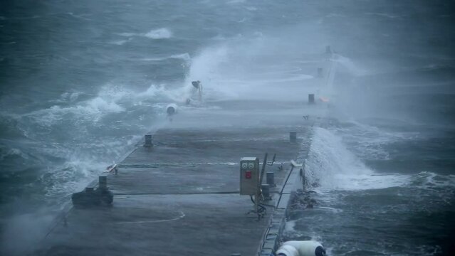 Ship dock rocking violently hurricane force wind and rain Iceland
