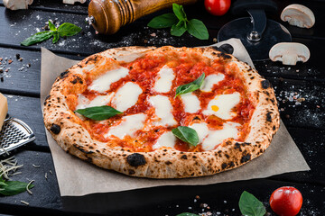 Pizza with mozzarella, tomato sauce, spinach on a thick dough. - obrazy, fototapety, plakaty