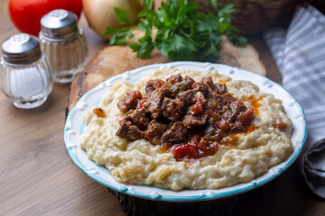 Turkish Food Hunkar Begendi made with Eggplant and Meat.