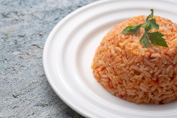 Traditional delicious Turkish food; rice pilaf with tomatoes (Turkish name; Domatesli pirinc pilavi)