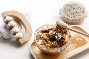 Spa composition with honey and dipper close up.