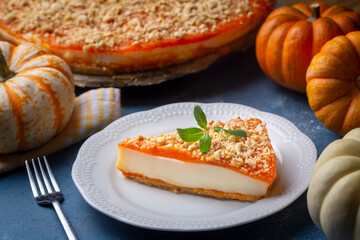 Handmade delicious pumpkin cheesecake and small pumpkins, Turkish name; balkabakli cheesecake. Pumpkin dessert.