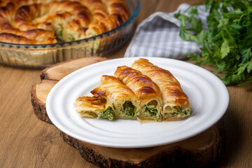 Turkish Tepsi Boregi, Round Borek, Tray pastry (Turkish name; rulo borek - ispanakli borek)