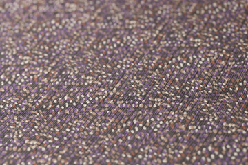 Multicolor spotted fabric as background.