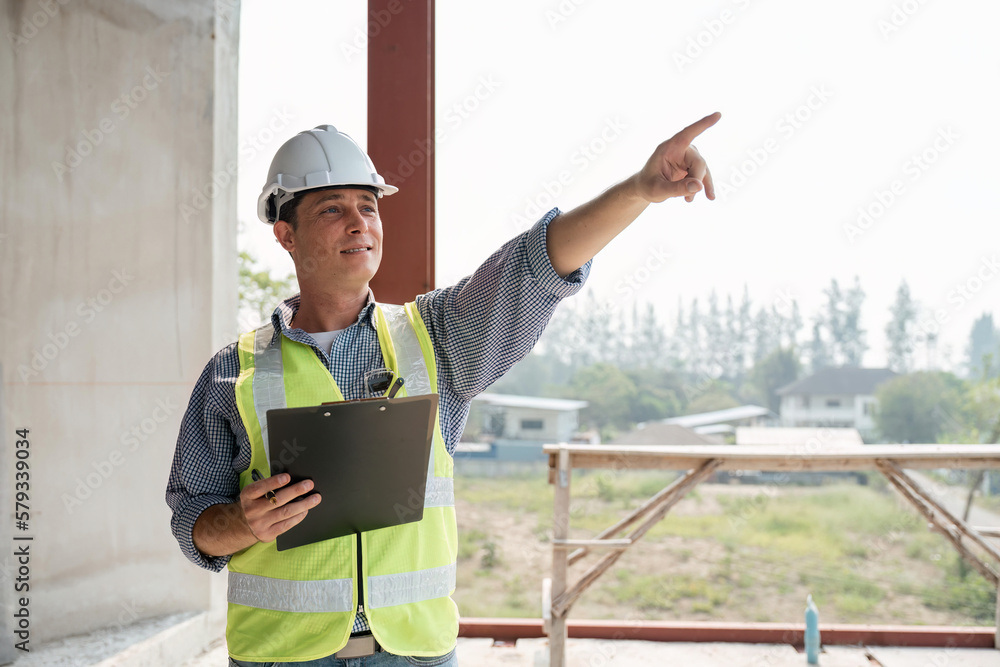 Poster young engineering with paperwork on the inspecting the reconstructed construction and renovation aft