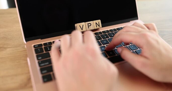 Best VPN services and female hands on laptop keyboard