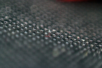 Texture of dark fabric in macro	
