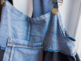 detail of clothing with elements of cotton and denim