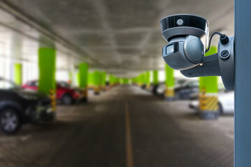 CCTV Security Camera setup on Parking lot. Copy space.