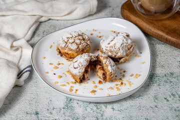 Freshly baked cream puffs. Eclair cake with cream and chocolate filling