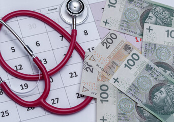 Kalendarz wizyt u lekarza z gotówką i stetoskopem - obrazy, fototapety, plakaty