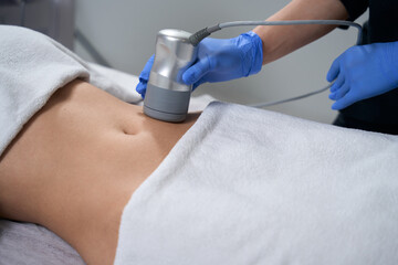 Medic doing course of anti-aging procedures for skin